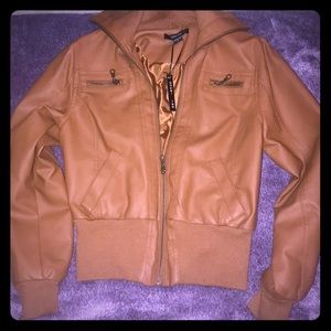 A brand new never worn brown blazer.